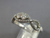 ESTATE .54CT DIAMOND 14KT WHITE GOLD 3D CLASSIC ROUND 2 STONE INFINITY LOVE RING