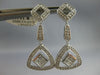 LARGE .96CT DIAMOND 18KT WHITE GOLD ROUND & PRINCESS TRIANGULAR HANGING EARRINGS