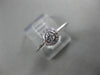 ESTATE .15CT DIAMOND 18KT WHITE GOLD CLASSIC FLOWER HALO BEZEL FRIENDSHIP RING