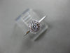 ESTATE .15CT DIAMOND 18KT WHITE GOLD CLASSIC FLOWER HALO BEZEL FRIENDSHIP RING