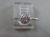 ESTATE .15CT DIAMOND 18KT WHITE GOLD CLASSIC FLOWER HALO BEZEL FRIENDSHIP RING