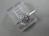 ESTATE .15CT DIAMOND 18KT WHITE GOLD CLASSIC FLOWER HALO BEZEL FRIENDSHIP RING