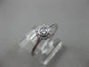 ESTATE .15CT DIAMOND 18KT WHITE GOLD CLASSIC FLOWER HALO BEZEL FRIENDSHIP RING
