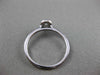 ESTATE .15CT DIAMOND 18KT WHITE GOLD CLASSIC FLOWER HALO BEZEL FRIENDSHIP RING