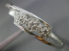 ESTATE .10CT DIAMOND 14KT WHITE GOLD PAST PRESENT FUTURE FLOWER BANGLE BRACELET
