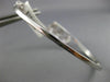 ESTATE .10CT DIAMOND 14KT WHITE GOLD PAST PRESENT FUTURE FLOWER BANGLE BRACELET