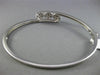ESTATE .10CT DIAMOND 14KT WHITE GOLD PAST PRESENT FUTURE FLOWER BANGLE BRACELET