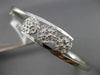 ESTATE .10CT DIAMOND 14KT WHITE GOLD PAST PRESENT FUTURE FLOWER BANGLE BRACELET