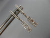 ESTATE .31CT ROUND & BAGUETTE DIAMOND 14KT WHITE GOLD ELONGATED HANGING EARRINGS
