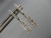 ESTATE .31CT ROUND & BAGUETTE DIAMOND 14KT WHITE GOLD ELONGATED HANGING EARRINGS