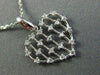 ESTATE .18CT DIAMOND 14KT WHITE GOLD 3D OPEN HEART CLUSTER FLOATING LOVE PENDANT