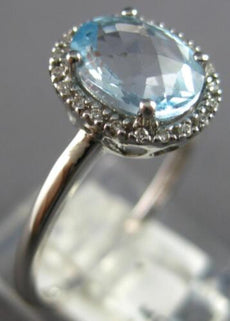 2.12CT DIAMOND & AAA AQUAMARINE 18KT WHITE GOLD 3D OVAL & ROUND ENGAGEMENT RING