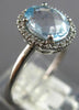 2.12CT DIAMOND & AAA AQUAMARINE 18KT WHITE GOLD 3D OVAL & ROUND ENGAGEMENT RING