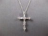 .33CT DIAMOND 18KT WHITE GOLD 3D CLASSIC ROUND & BAGUETTE CROSS FLOATING PENDANT