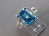 6.40CT DIAMOND & AAA BLUE TOPAZ 14KT WHITE GOLD 3D EMERALD CUT & ROUND HALO RING
