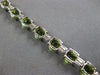 17.46CT DIAMOND & AAA PERIDOT 14KT WHITE GOLD 3D CUSHION & ROUND TENNIS BRACELET