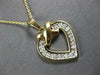 ESTATE .30CT DIAMOND 14KT 2 TONE GOLD CLASSIC OPEN HEART X LOVE FLOATING PENDANT
