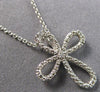 ESTATE SMALL .03CT DIAMOND 14KT WHITE GOLD 3D CROSS INFINITY FLOATING PENDANT