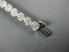 ESTATE WIDE 4.05CT DIAMOND 14KT WHITE GOLD CLUSTER ROUND 4 PRONG TENNIS BRACELET