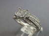 .50CT DIAMOND 14KT WHITE GOLD ROUND & PRINCESS SQUARE INVISIBLE ENGAGEMENT RING