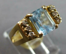 1.48CT DIAMOND AND AAA AQUAMRINE 14KT YELLOW GOLD EMERALD CUT ENGAGEMENT RING