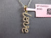 ESTATE .16CT DIAMOND 14KT YELLOW GOLD 3D CLASSIC SCRIPT LOVE FLOATING PENDANT
