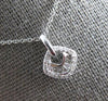 SMALL .23CT DIAMOND 14KT WHITE GOLD 3D ROUND & BAGUETTE SQUARE FLOATING PENDANT