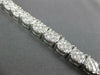 ESTATE WIDE 5.52CT DIAMOND 18KT WHITE GOLD 3D CLUSTER ROUND TENNIS BRACELET