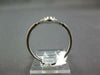 ESTATE .26CT DIAMOND & AAA EMERALD 18KT WHITE GOLD OPEN FILIGREE STAR FUN RING