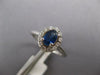 ESTATE .74CT DIAMOND & AAA SAPPHIRE 14K WHITE GOLD OVAL & ROUND FLOWER LOVE RING
