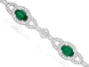 4.18CT DIAMOND & AAA EMERALD 14KT WHITE GOLD OVAL & ROUND HALO TENNIS BRACELET