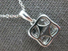 ESTATE .60CT DIAMOND 14KT WHITE GOLD ROUND PRINCESS & BAGUETTE FLOATING PENDANT