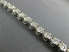ESTATE WIDE 4.05CT DIAMOND 14KT WHITE GOLD CLUSTER ROUND 4 PRONG TENNIS BRACELET