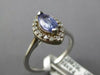 1.11CT DIAMOND & AAA TANZANITE 14KT WHITE GOLD MARQUISE & ROUND ENGAGEMENT RING