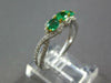 .91CT DIAMOND & AAA EMERALD 18KT 2 TONE GOLD OVAL & ROUND 3 STONE HALO LOVE RING
