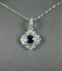 SMALL .40CT DIAMOND & AAA SAPPHIRE 18KT WHITE GOLD FLOWER LOVE FLOATING PENDANT