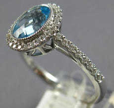 1.62CT DIAMOND & AAA BLUE TOPAZ 14KT WHITE GOLD 3D OVAL & ROUND ENGAGEMENT RING