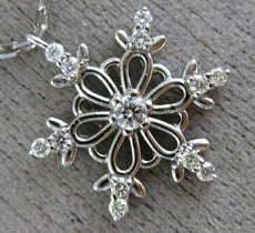 ESTATE .16CT DIAMOND 14KT WHITE GOLD 3D SNOWFLAKE FLOATING LOVE PENDANT