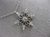 ESTATE .16CT DIAMOND 14KT WHITE GOLD 3D SNOWFLAKE FLOATING LOVE PENDANT