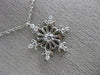 ESTATE .16CT DIAMOND 14KT WHITE GOLD 3D SNOWFLAKE FLOATING LOVE PENDANT
