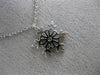 ESTATE .16CT DIAMOND 14KT WHITE GOLD 3D SNOWFLAKE FLOATING LOVE PENDANT