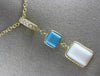 ESTATE .10CT DIAMOND TURQUOISE & WHITE QUARTZ 14KT YELLOW GOLD FLOATING PENDANT