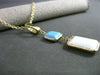 ESTATE .10CT DIAMOND TURQUOISE & WHITE QUARTZ 14KT YELLOW GOLD FLOATING PENDANT