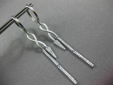 ESTATE LONG .28CT DIAMOND 14KT WHITE GOLD INFINITY LOVE HUGGIE HANGING EARRINGS