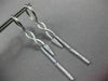ESTATE LONG .28CT DIAMOND 14KT WHITE GOLD INFINITY LOVE HUGGIE HANGING EARRINGS