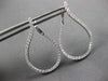 ESTATE LARGE 1.25CT DIAMOND 18KT WHITE GOLD TEAR DROP SIDEWAYS HANGING EARRINGS