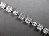 4.22CT DIAMOND 18KT WHITE GOLD ROUND BAGUETTE & MARQUISE SQUARE TENNIS BRACELET