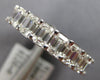 LARGE 4.08CT DIAMOND 18KT WHITE GOLD EMERALD CUT SHARED PRONG ANNIVERSARY RING
