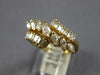 1.0CT DIAMOND 14KT YELLOW GOLD MARQUISE & BAGUETTE CRISS CROSS ANNIVERSARY RING