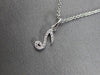 ESTATE .06CT DIAMOND 14KT WHITE GOLD CLASSIC MUSICAL NOTE FUN FLOATING PENDANT